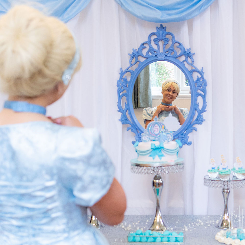 Cinderella looking into a mirror